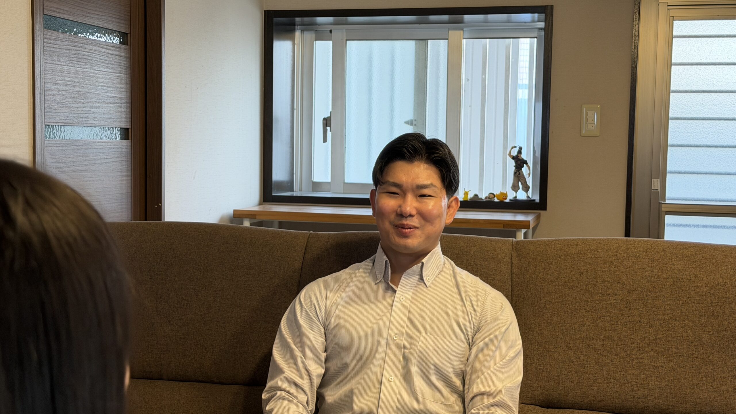 笑顔で語る大城さん